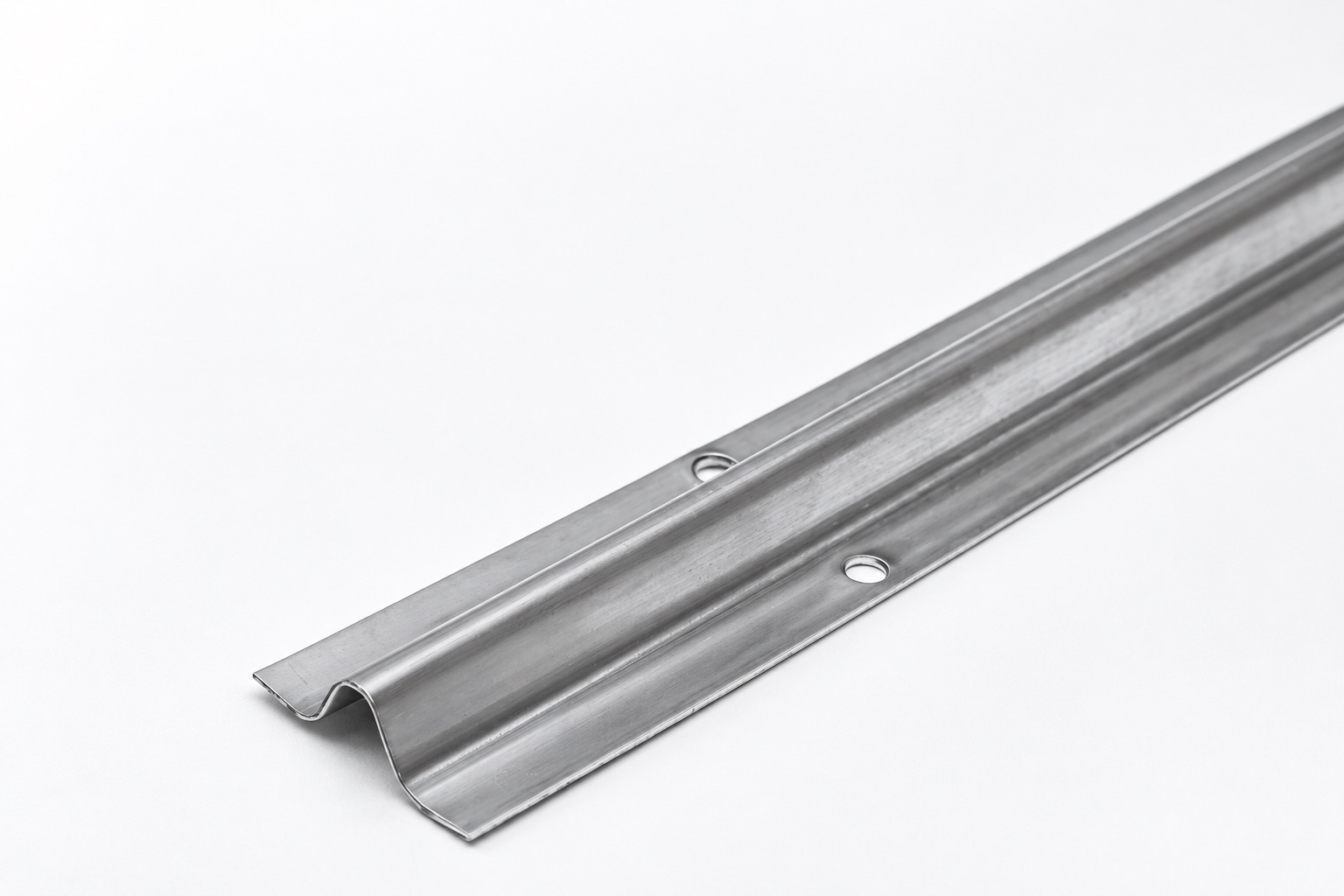 Close-up of the steel sliding door track and its inverted-V end profile
